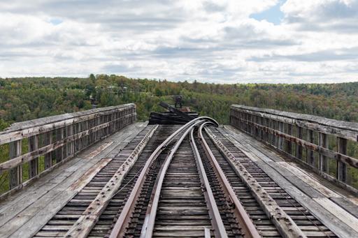 The Kinzua Bridge was the tallest railroad bridge in the world when it was finished in 1882. One night, the support structure was left unbolted from the foundation during a period of extended maintenance. A tornado rolled through that night, collapsing the middle portion of the bridge. Today the Kinzua Bridge is a State Park.