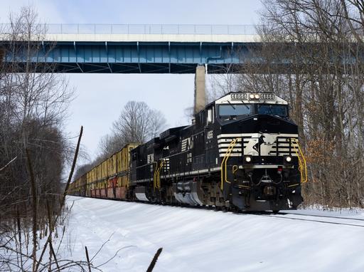 A mixed-freight and intermodal Norfolk Southern train heads southbound under Clarks Summit's Freedom Bridge. It was -20F with windchill when this photo was taken, and my hand was in severe physical pain after 30 seconds of being exposed.
