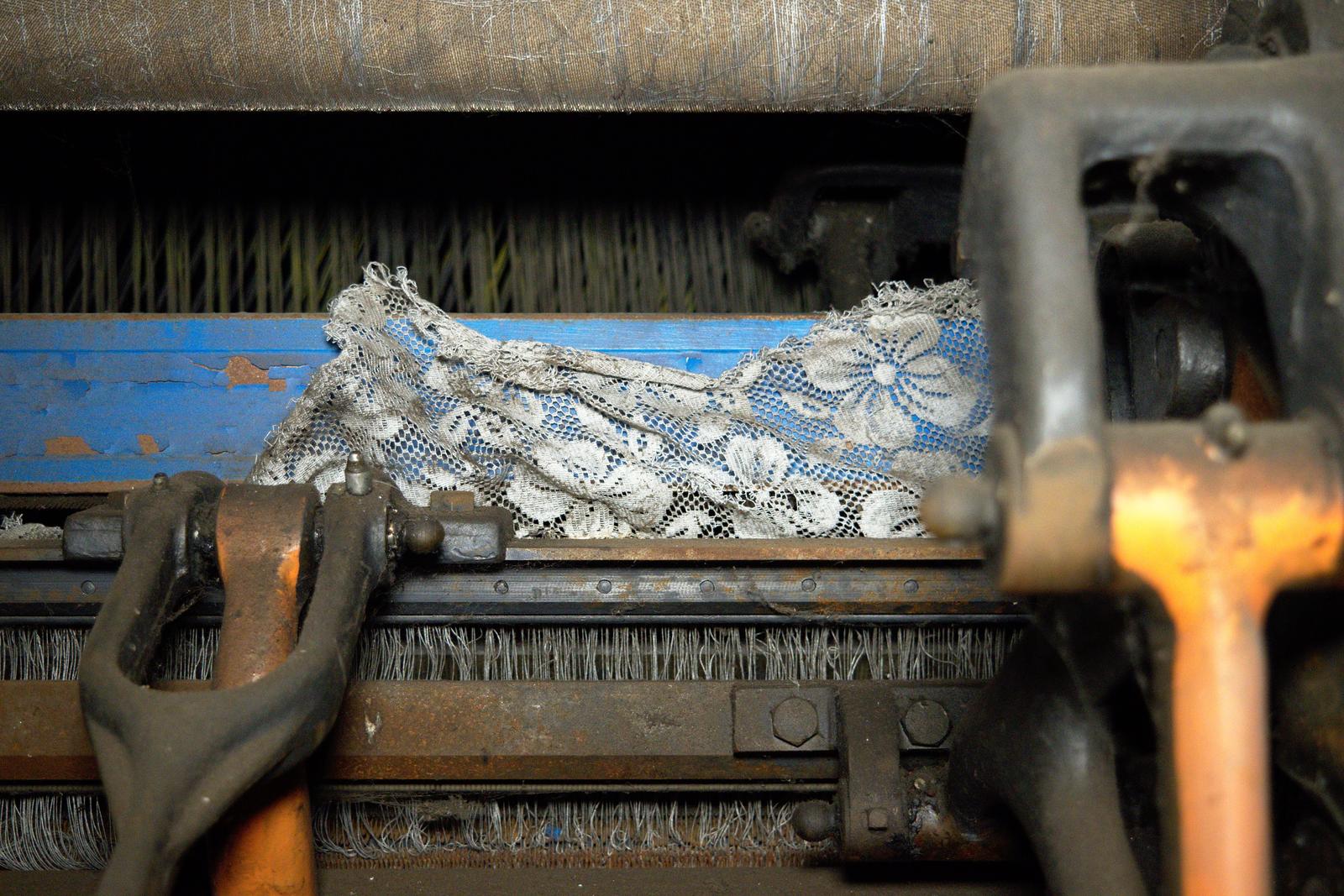 At the now-demolished Scranton Lace Factory, the final production run of lace can be seen sitting in a loom, cut off and left to sit forever.