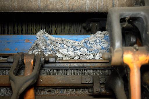 At the now-demolished Scranton Lace Factory, the final production run of lace can be seen sitting in a loom, cut off and left to sit forever.