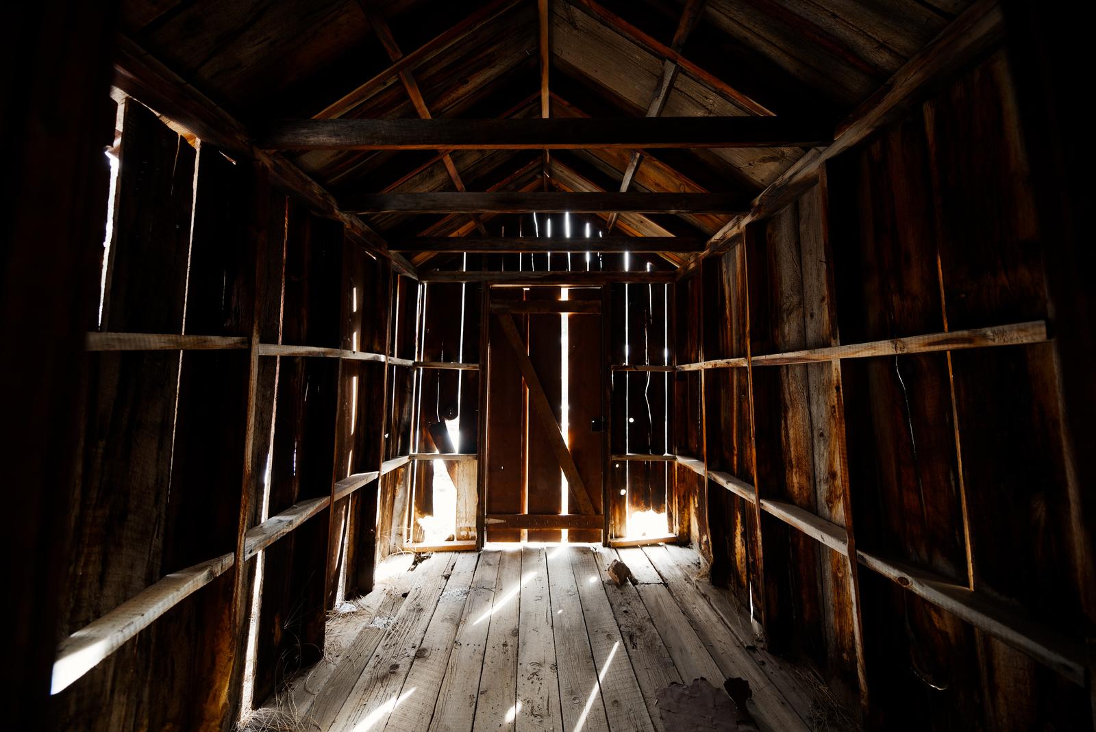 Light seeps into the entryway.