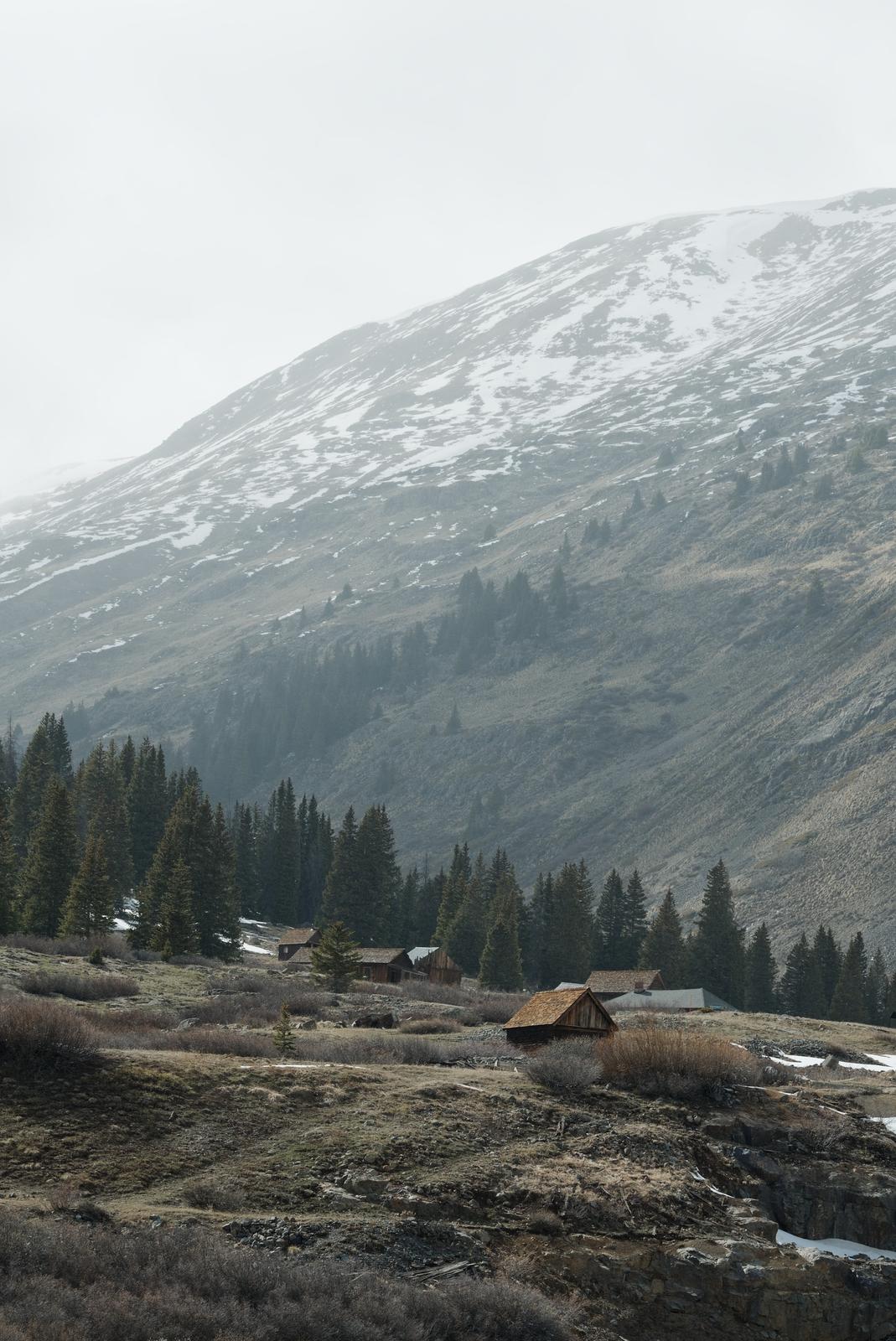 The Animas Forks ghost town as a mild snowstorm rolls in.