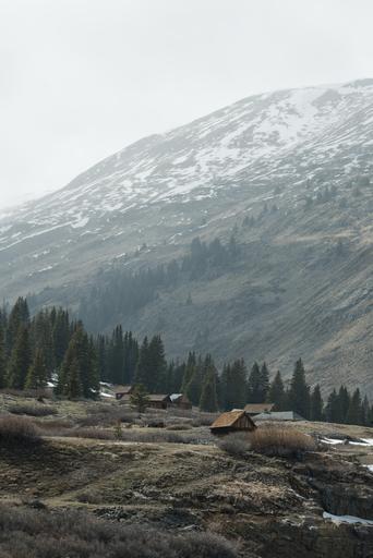 The Animas Forks ghost town as a mild snowstorm rolls in.