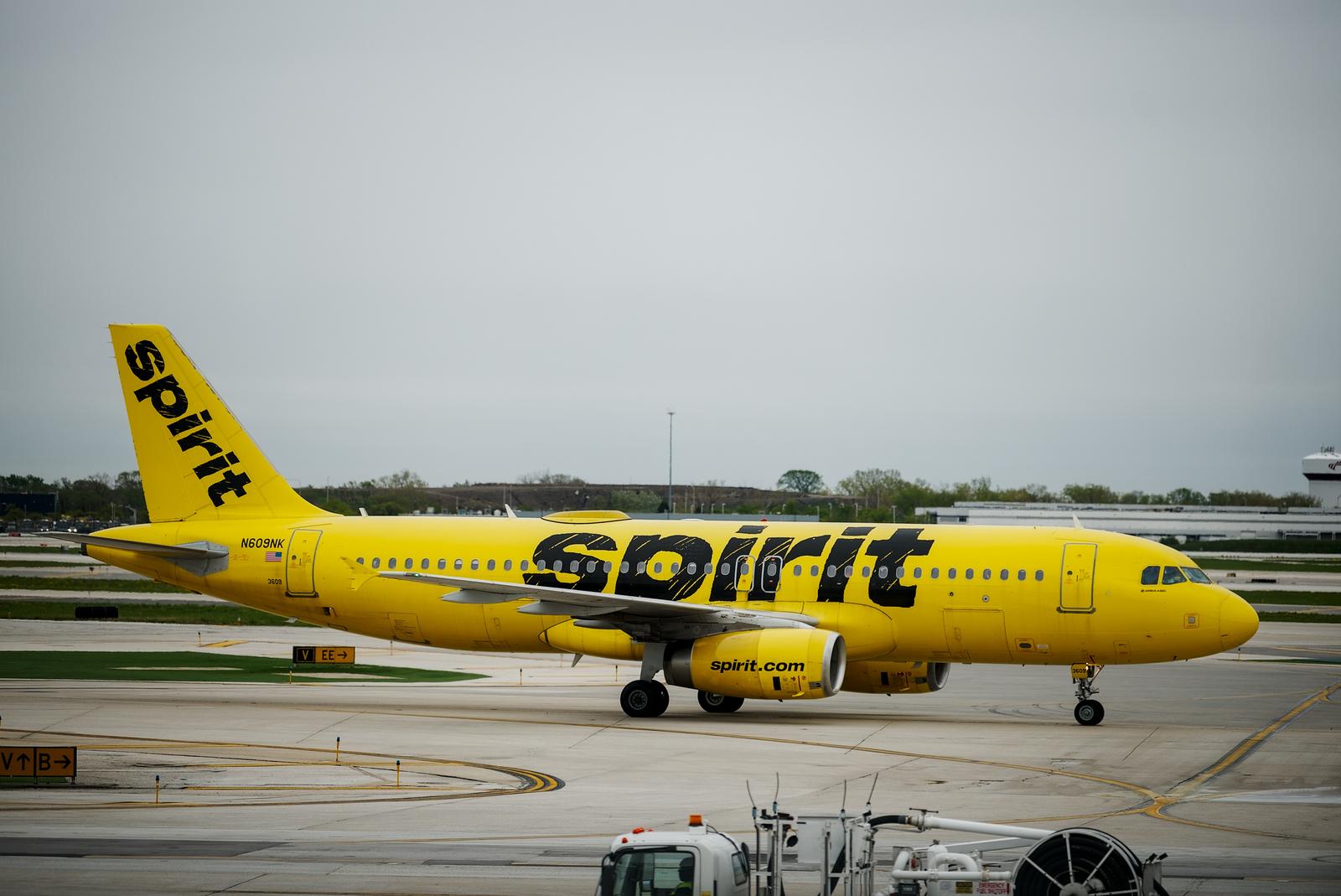 Planespotting during a layover at ORD, I unintentionally captured one of the last Spirit flights ever.