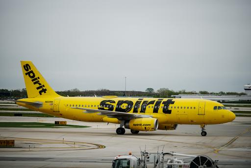 Planespotting during a layover at ORD, I unintentionally captured one of the last Spirit flights ever.