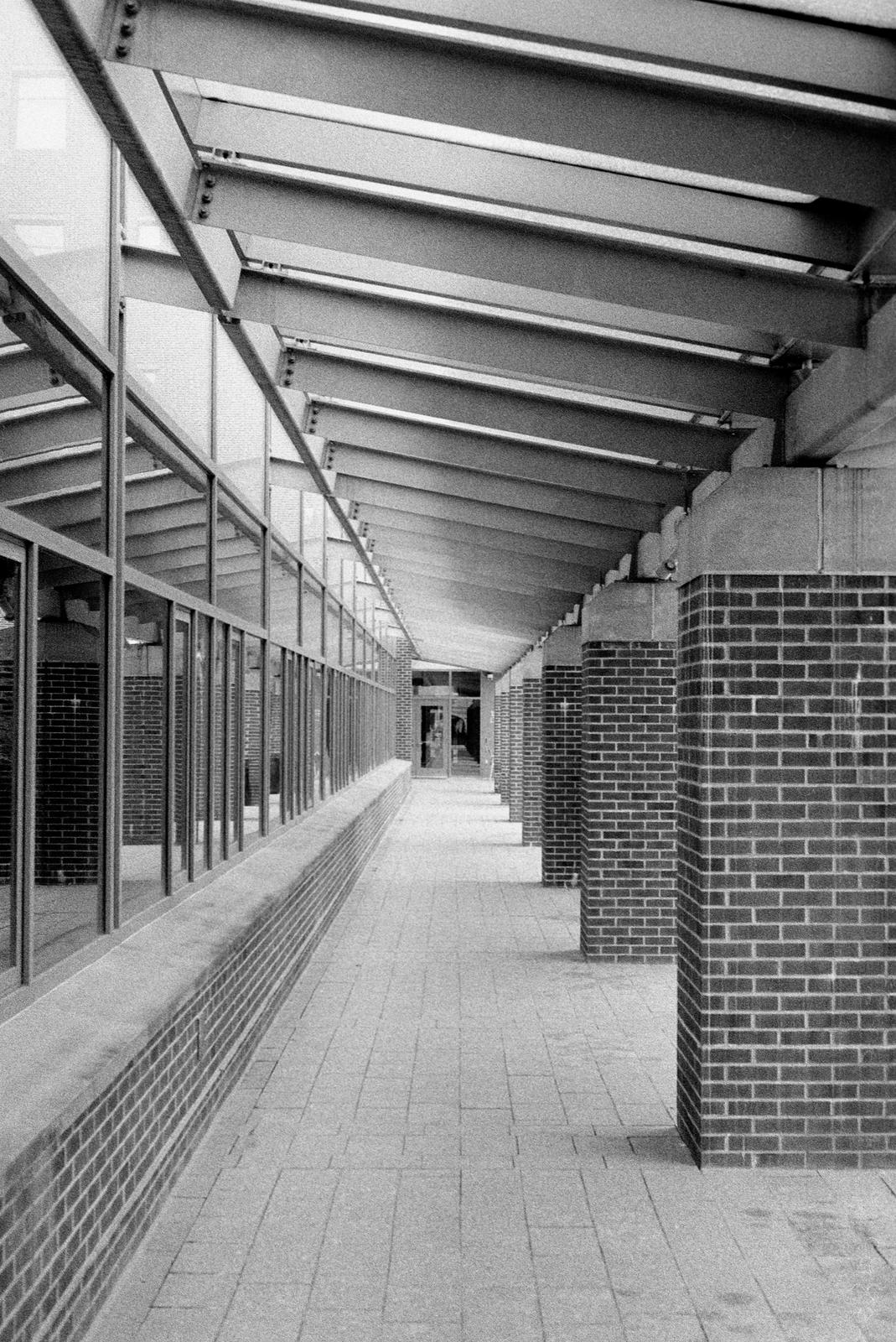 Looking down the telescoping walkway of Penn State's Benkovic building. Pentax ME Super + 50mm f/2 SMC.