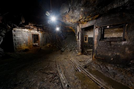 A mine hospital sits at the end of a collapsed mine tunnel.